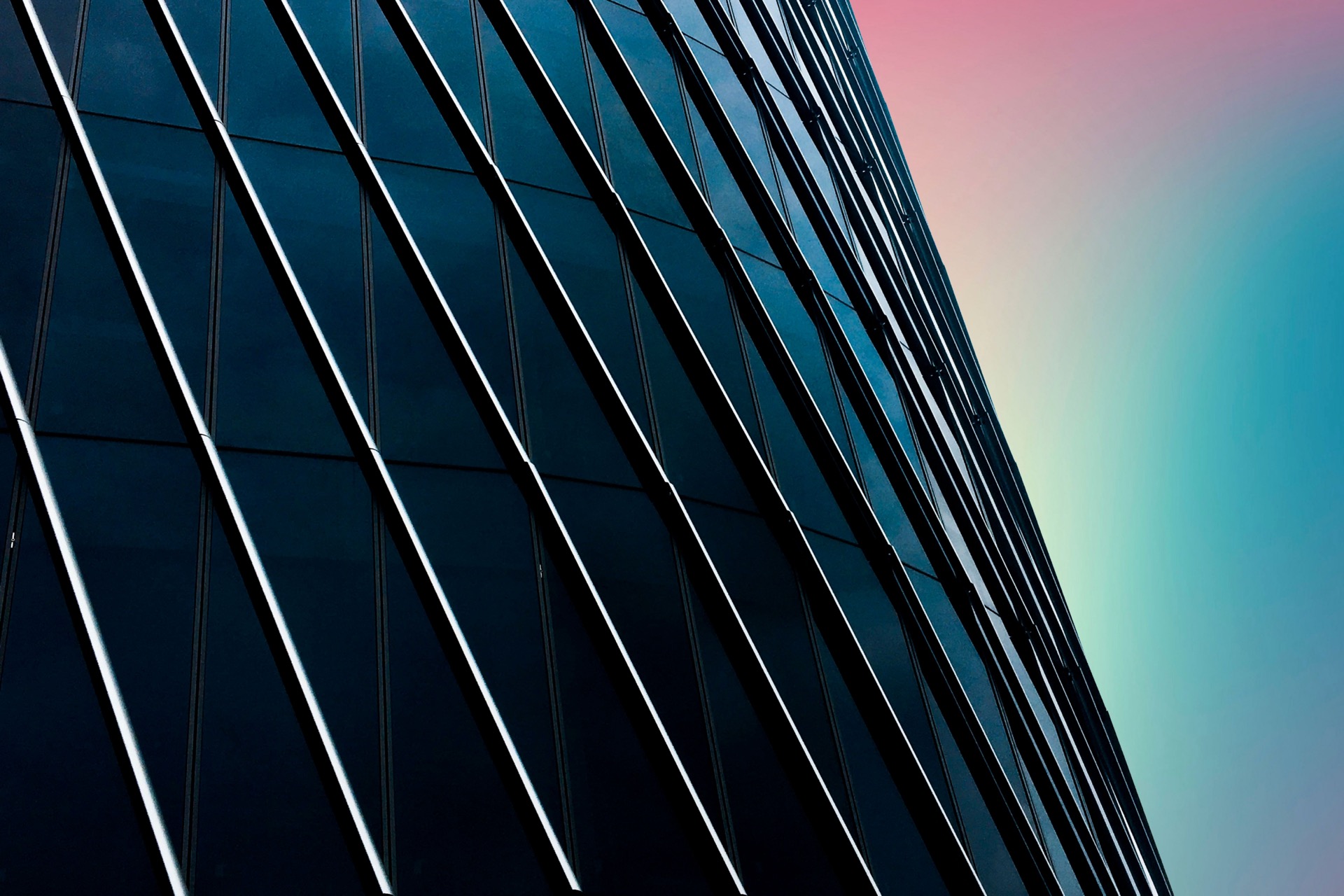 Dark vertical architectural fins at dusk